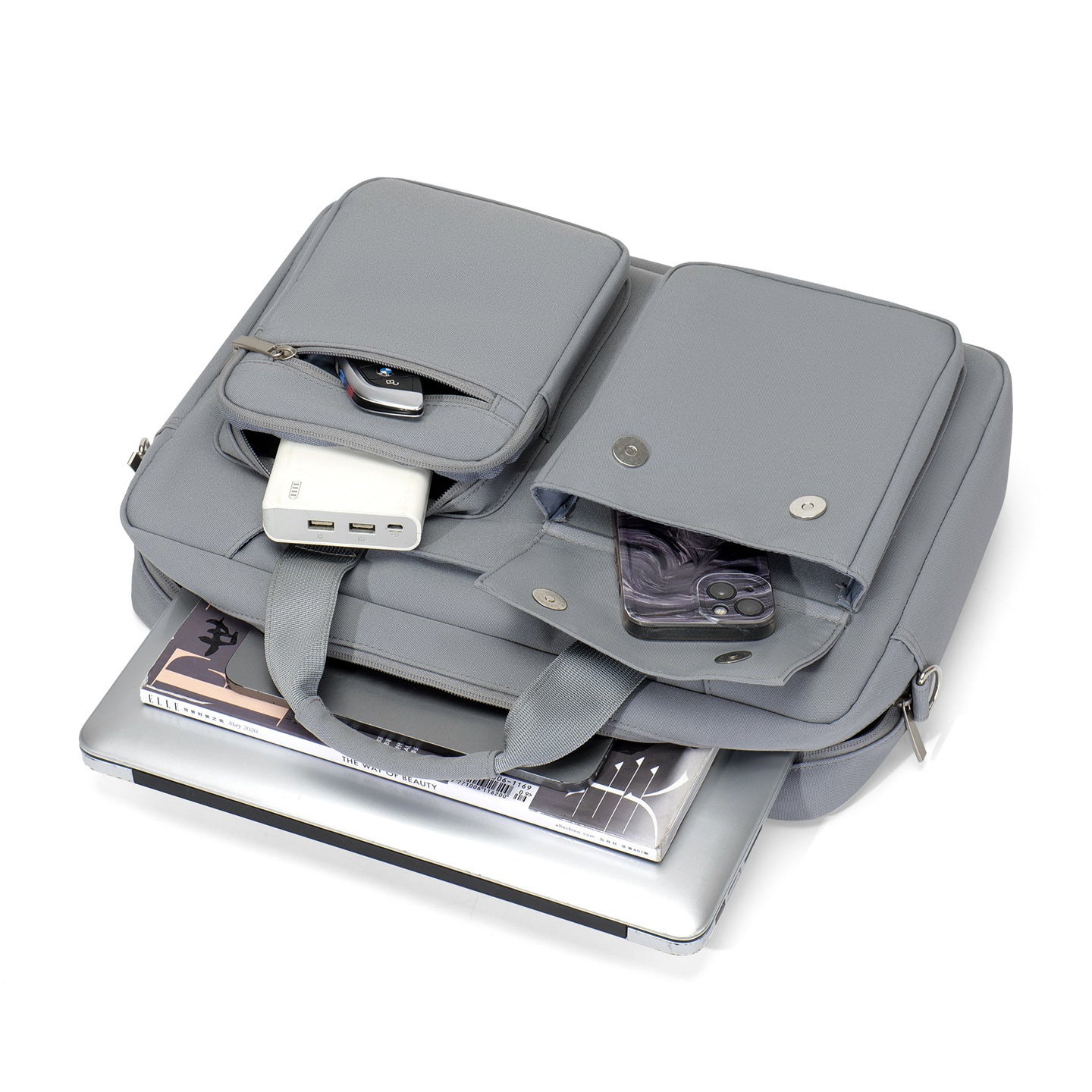 Gray briefcase with compartments and a USB drive on a white background